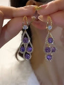 Brinco de Cascata Roxa Brilhante <strong>(COMPRE 1 PAR LEVE 2)</strong>